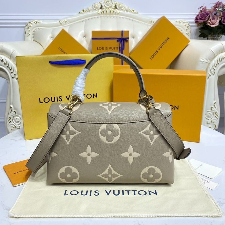 LOUIS VUITTON MADELEINE BAG